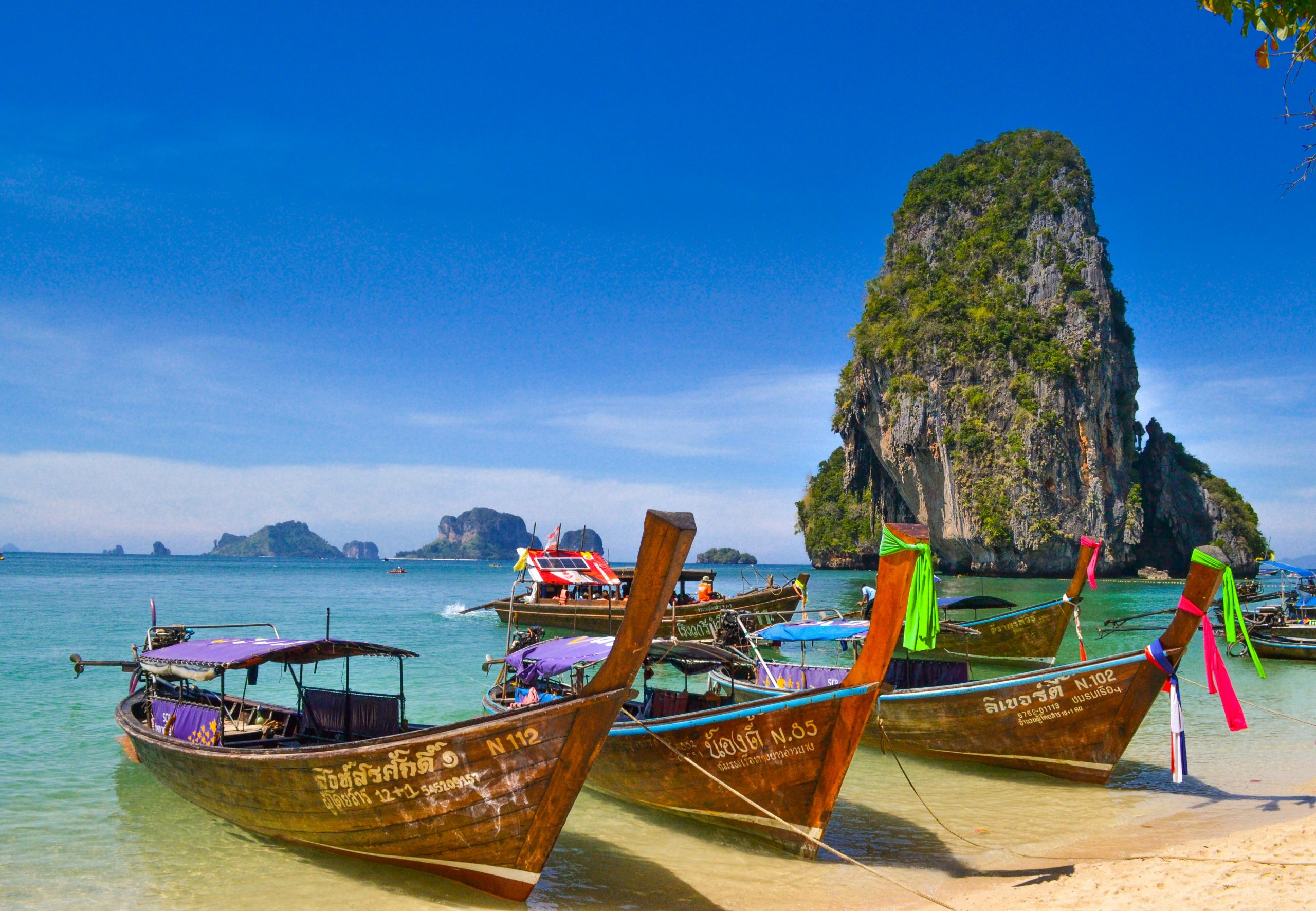 Thailand Longtail Boat and Limestone Cliffs